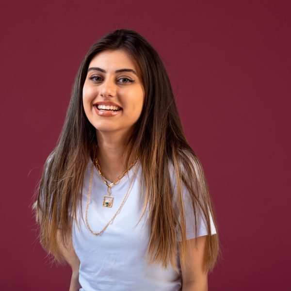 Female model photo session in casting on pink background. High quality photo